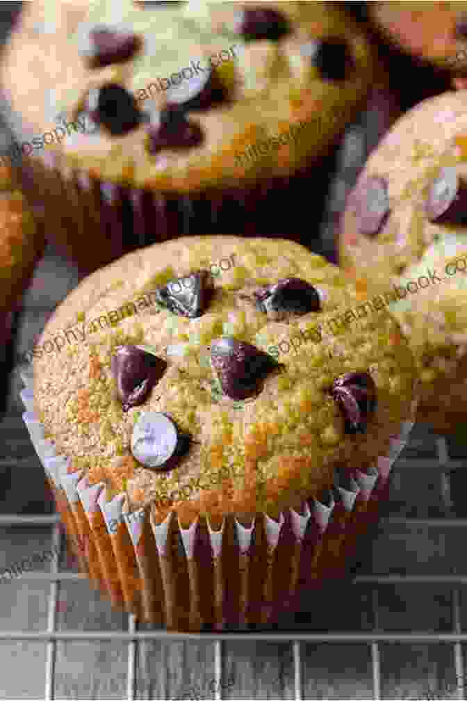 Banana Muffins With Golden Brown Tops And Banana Slices 101 Quick Easy Cupcake And Muffin Recipes
