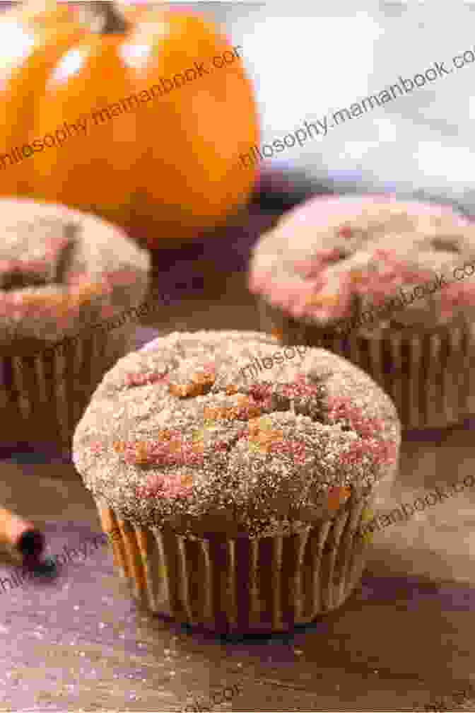 Pumpkin Spice Muffins With Golden Brown Tops And Pumpkin Spice Filling 101 Quick Easy Cupcake And Muffin Recipes