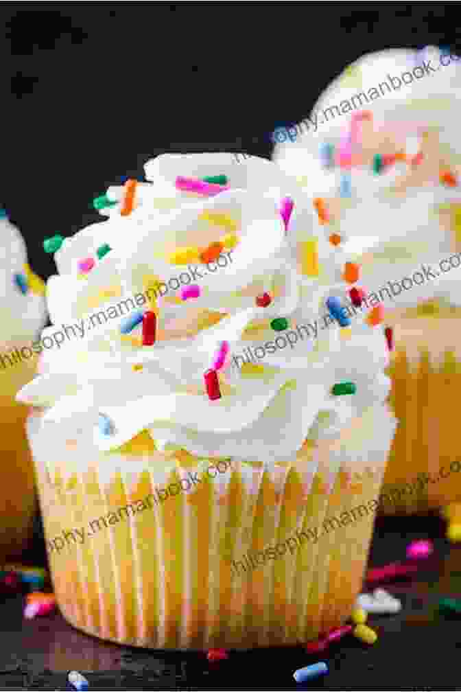 Vanilla Cupcakes Topped With Vanilla Frosting And Rainbow Sprinkles 101 Quick Easy Cupcake And Muffin Recipes